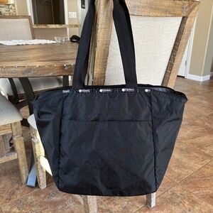 LeSportsac Easy Carry Tote Black Nylon Zip Top Shoulder Bag Snap Front Pocket